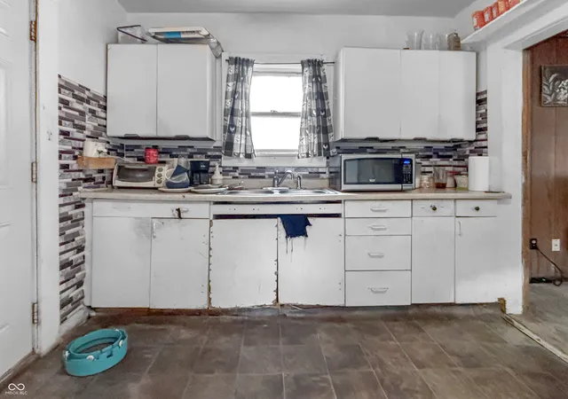 Photo 4 of Single family home for sale at 115 N Sherman Dr, Indianapolis, IN 46201 | MLS# 22120784 | Listing updated on 2026-10-06