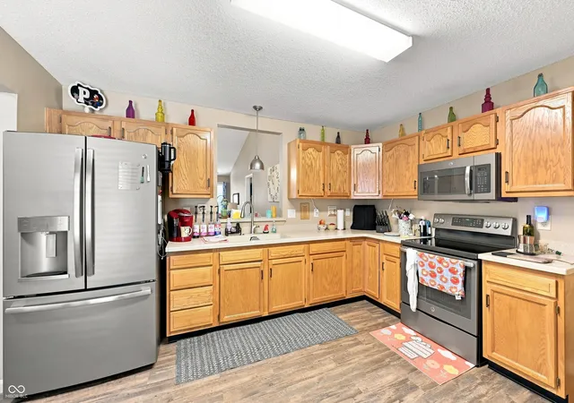 Photo 4 of Single family home for sale at 9717 Treyburn Green Wy, Indianapolis, IN 46239 | MLS# 22122239 | Listing updated on 2026-10-21