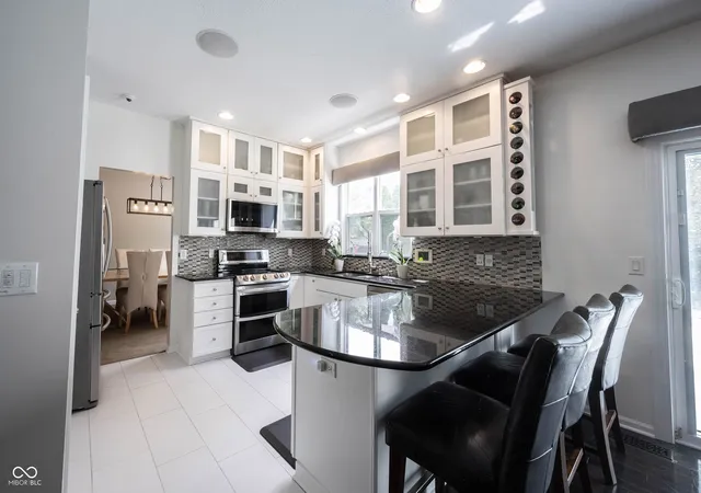 Photo 3 of Single family home for sale at 14630 Deerwood Dr, Carmel, IN 46033 | MLS# 22122330 | Listing updated on 2026-09-24