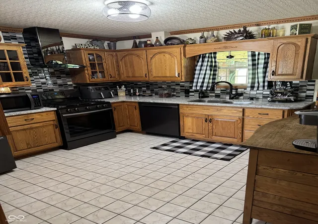 Photo 4 of Single family home for sale at 1405 E 8th Street, Anderson, IN 46012 | MLS# 22123345 | Listing updated on 2026-09-05