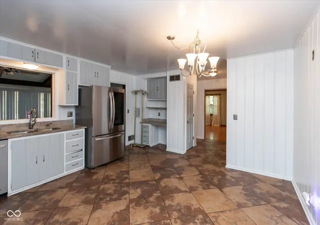 Photo 4 of Single family home for sale at 4936 Winston Dr, Indianapolis, IN 46226 | MLS# 22124953 | Listing updated on 2026-10-04