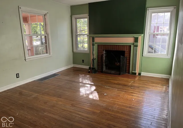Photo 2 of Single family home for sale at 310 Ohmer Ave, Indianapolis, IN 46219 | MLS# 22126136 | Listing updated on 2026-10-09