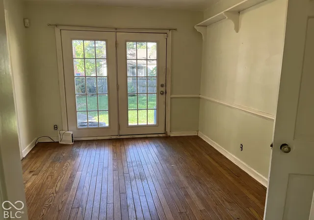 Photo 3 of Single family home for sale at 310 Ohmer Ave, Indianapolis, IN 46219 | MLS# 22126136 | Listing updated on 2026-10-09