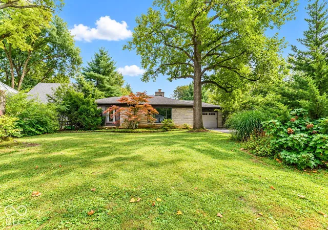 Photo 3 of Single family home for sale at 711 E 70th Place, Indianapolis, IN 46220 | MLS# 22126536 | Listing updated on 2026-10-01
