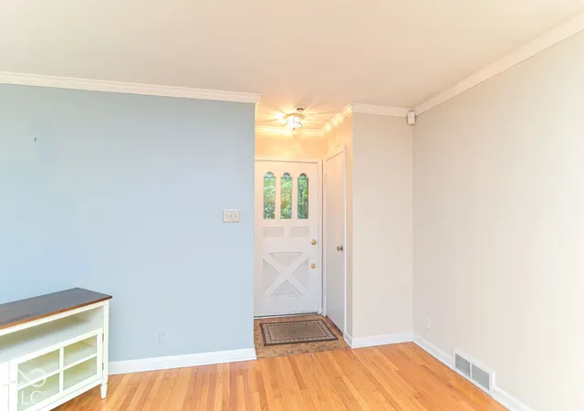 Photo 4 of Single family home for sale at 711 E 70th Place, Indianapolis, IN 46220 | MLS# 22126536 | Listing updated on 2026-10-01