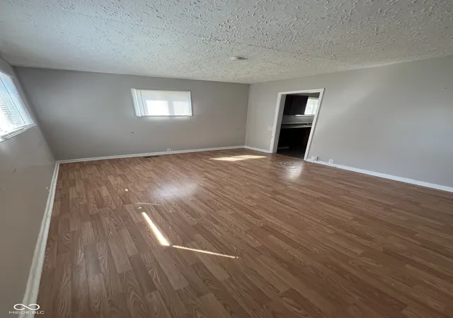 Photo 3 of Single family home for sale at 606 S Spencer Ave, Indianapolis, IN 46219 | MLS# 22126739 | Listing updated on 2026-10-08