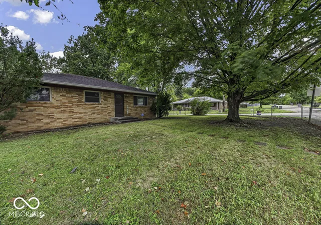 Photo 4 of Single family home for sale at 1642 N Graham Ave, Indianapolis, IN 46218 | MLS# 22127330 | Listing updated on 2026-09-23