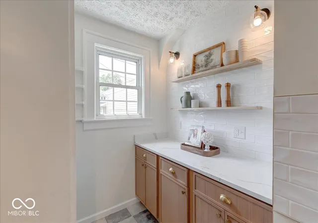 Photo 4 of Single family home for sale at 102 N Sheridan Ave, Indianapolis, IN 46219 | MLS# 22127361 | Listing updated on 2026-09-21