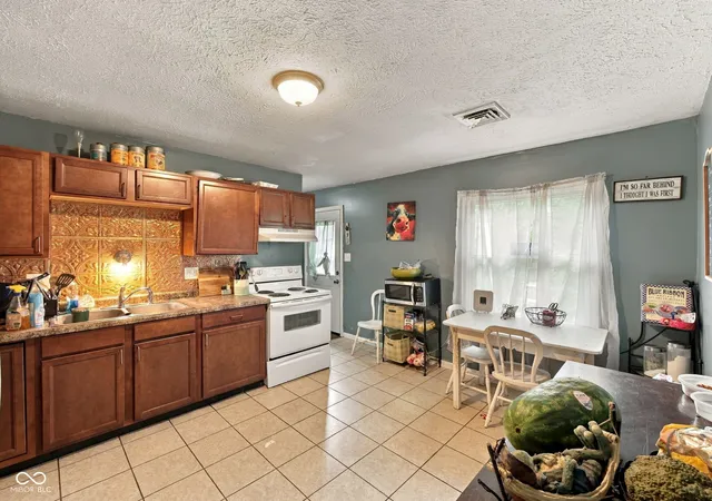 Photo 4 of Single family home for sale at 4214 Phoenix Dr, Indianapolis, IN 46241 | MLS# 22127518 | Listing updated on 2026-09-22
