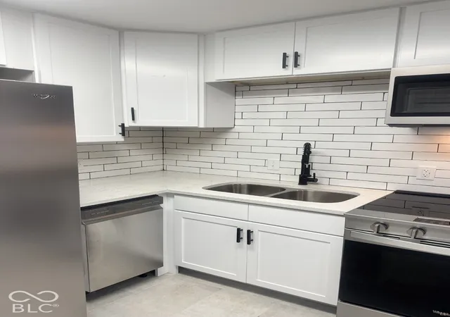 Photo 3 of Single family home for sale at 1616 Englewood Dr, Indianapolis, IN 46219 | MLS# 22127961 | Listing updated on 2026-10-14
