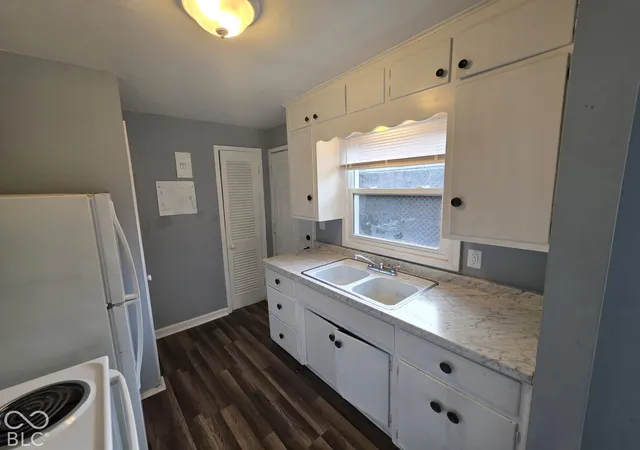 Photo 3 of Multi family home for sale at 1207 1209 E 11th Street, Anderson, IN 46012 | MLS# 22128023 | Listing updated on 2026-10-26