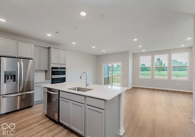 Photo 2 of Townhouse for sale at 9895 Behner Dr, Indianapolis, IN 46250 | MLS# 22128059 | Listing updated on 2026-09-25