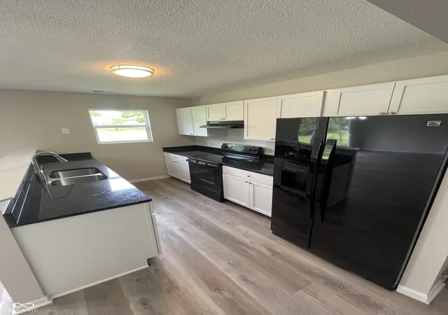 Photo 3 of Single family home for sale at 2717 N Rural St, Indianapolis, IN 46218 | MLS# 22128135 | Listing updated on 2026-10-16