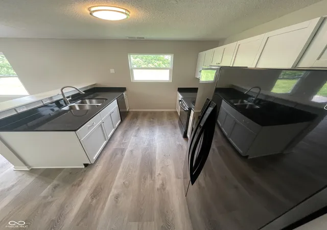 Photo 3 of Single family home for sale at 2717 N Rural St, Indianapolis, IN 46218 | MLS# 22128135 | Listing updated on 2026-10-16