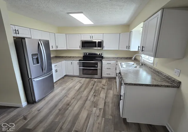 Photo 4 of Single family home for sale at 445 Tulip Dr, Indianapolis, IN 46227 | MLS# 22128272 | Listing updated on 2026-10-02