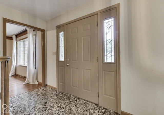 Photo 3 of Single family home for sale at 594 Watterson Ct, Indianapolis, IN 46217 | MLS# 22128294 | Listing updated on 2026-09-26