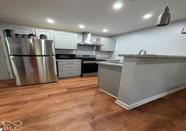 Photo 4 of House for sale at 2220 N Kenyon St, Indianapolis, IN 46219 | MLS# 22128386 | Listing updated on 2026-09-27