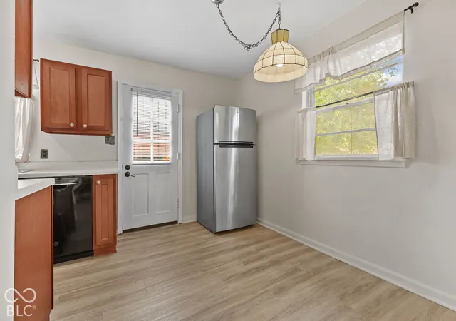 Photo 3 of Single family home for sale at 313 S Sheridan Ave, Indianapolis, IN 46219 | MLS# 22128634 | Listing updated on 2026-09-30