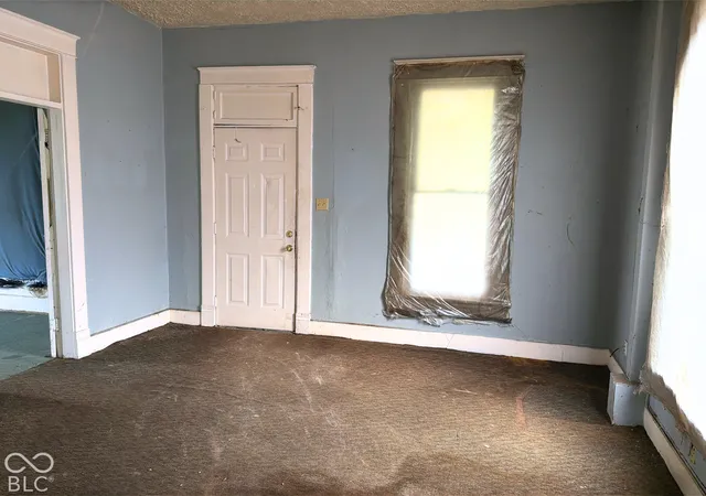 Photo 2 of Single family home for sale at 2326 Adams St, Indianapolis, IN 46218 | MLS# 22128982 | Listing updated on 2026-10-06