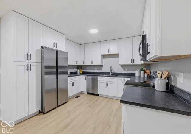 Photo 3 of Single family home for sale at 1720 W Hamblen Dr, Indianapolis, IN 46231 | MLS# 22129072 | Listing updated on 2026-09-30