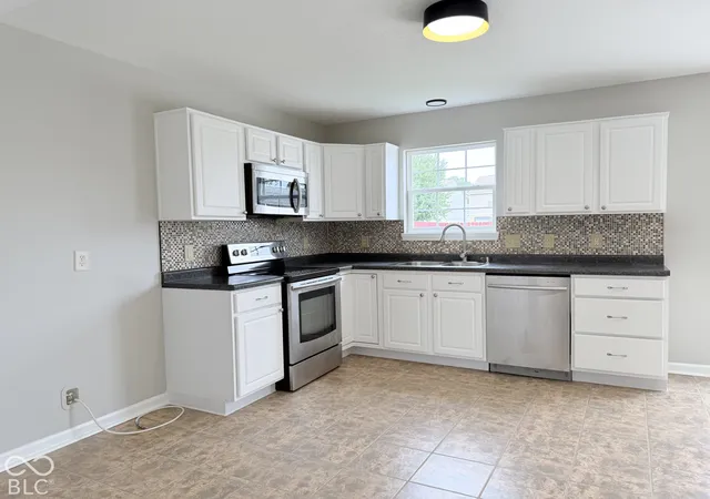 Photo 4 of Single family home for sale at 5834 Jackie Ln, Indianapolis, IN 46221 | MLS# 22129130 | Listing updated on 2026-10-05