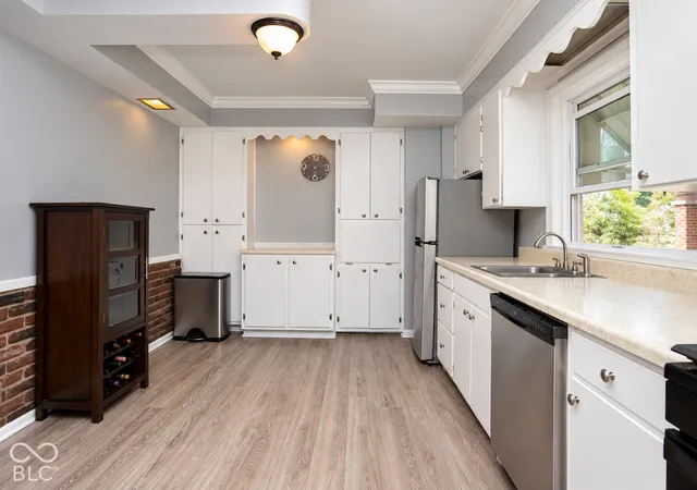 Photo 4 of Single family home for sale at 1202 N Downey Ave, Indianapolis, IN 46219 | MLS# 22129300 | Listing updated on 2026-10-02