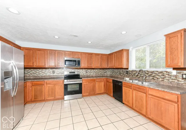 Photo 3 of Single family home for sale at 8030 Cole Wood Blvd, Indianapolis, IN 46239 | MLS# 22129618 | Listing updated on 2026-10-06