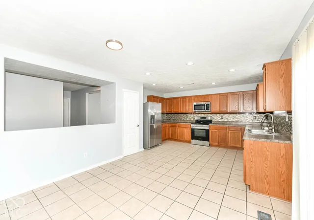 Photo 4 of Single family home for sale at 8030 Cole Wood Blvd, Indianapolis, IN 46239 | MLS# 22129618 | Listing updated on 2026-10-06