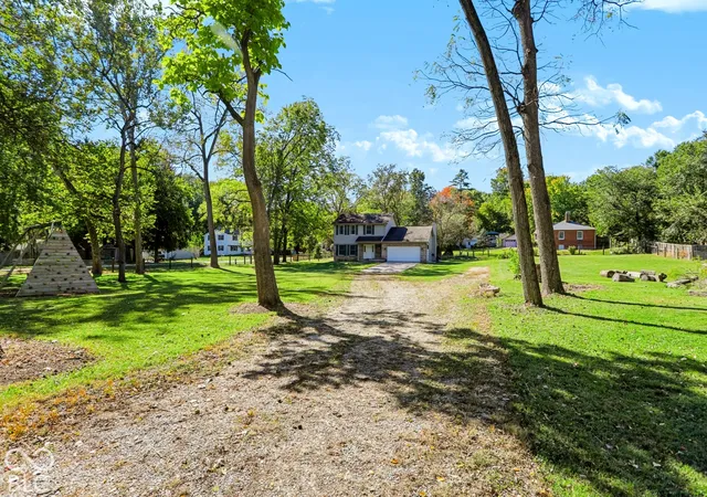 Photo 4 of Single family home for sale at 6802 E Pleasant Run Pkwy N Dr, Indianapolis, IN 46219 | MLS# 22129915 | Listing updated on 2026-10-08