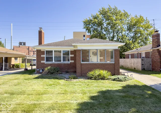 Photo 1 of Single family home for sale at 1443 N Downey Ave, Indianapolis, IN 46219 | MLS# 22130388 | Listing updated on 2026-10-27