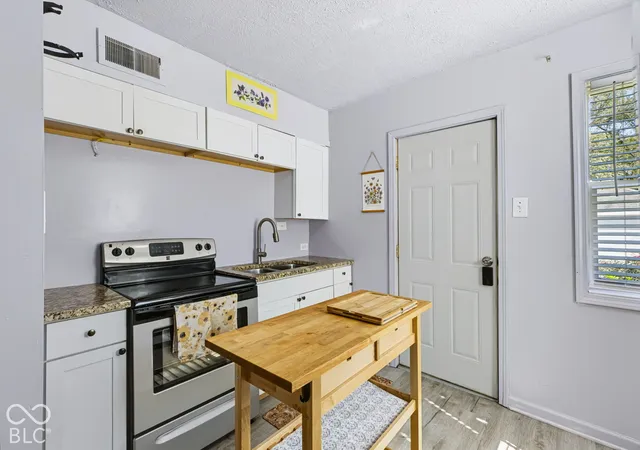 Photo 3 of Single family home for sale at 2101 Sharon Ave, Indianapolis, IN 46222 | MLS# 22130413 | Listing updated on 2026-10-08