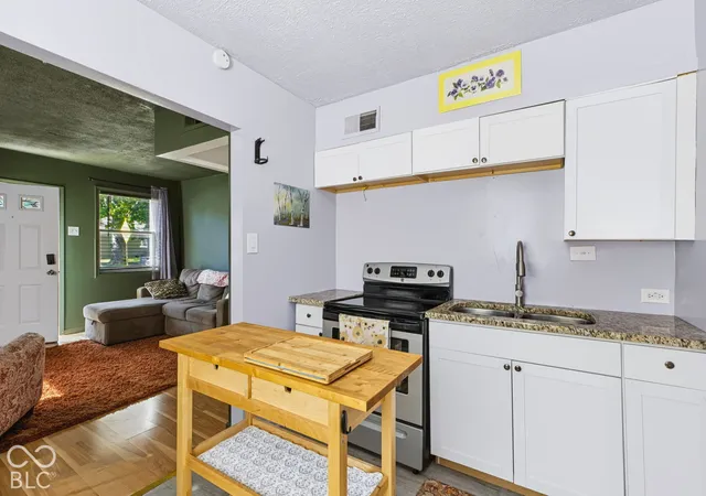 Photo 4 of Single family home for sale at 2101 Sharon Ave, Indianapolis, IN 46222 | MLS# 22130413 | Listing updated on 2026-10-08