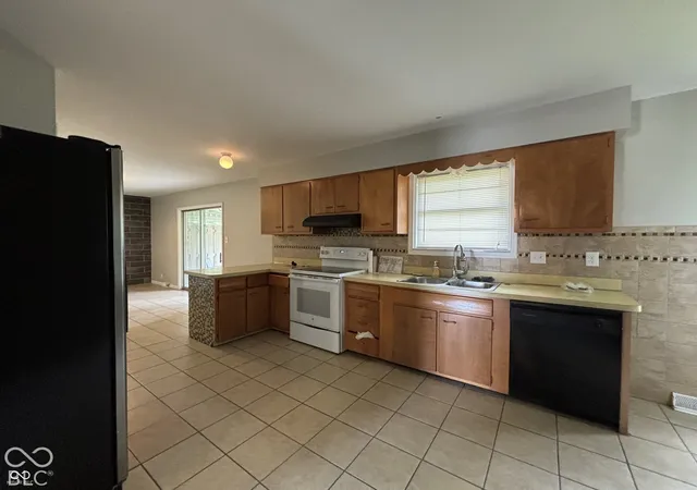 Photo 4 of Single family home for sale at 1345 Carroll White Dr, Indianapolis, IN 46219 | MLS# 22130928 | Listing updated on 2026-10-10