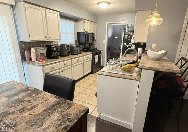Photo 2 of Single family home for sale at 928 W 79th Street, Indianapolis, IN 46260 | MLS# 22131393 | Listing updated on 2026-10-21
