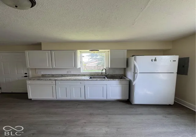 Photo 3 of Single family home for sale at 1609 Harlan St, Indianapolis, IN 46203 | MLS# 22132268 | Listing updated on 2026-10-23