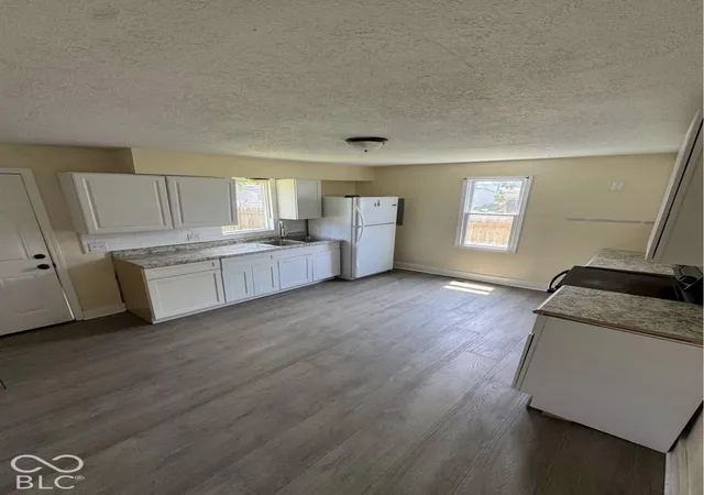 Photo 4 of Single family home for sale at 1609 Harlan St, Indianapolis, IN 46203 | MLS# 22132268 | Listing updated on 2026-10-23