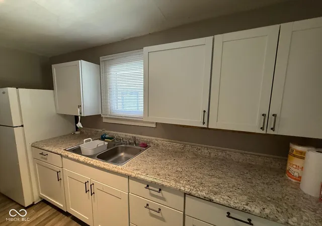 Photo 3 of House for sale at 933 N Ewing St, Indianapolis, IN 46201 | MLS# 22132400 | Listing updated on 2026-10-28