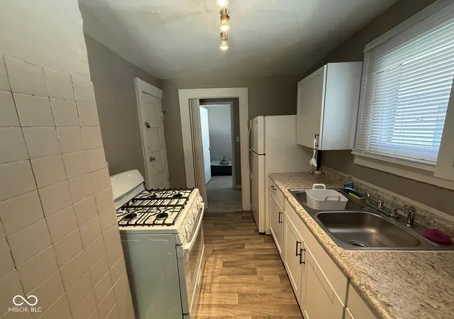 Photo 4 of House for sale at 933 N Ewing St, Indianapolis, IN 46201 | MLS# 22132400 | Listing updated on 2026-10-28