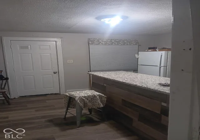 Photo 3 of Multi family home for sale at 933 N Ewing St, Indianapolis, IN 46201 | MLS# 22132400 | Listing updated on 2026-10-28
