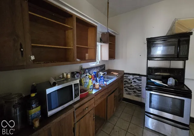 Photo 3 of Single family home for sale at 1834 Orleans St, Indianapolis, IN 46203 | MLS# 22132553 | Listing updated on 2026-10-21