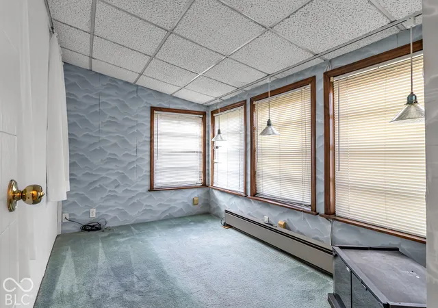 Photo 2 of Single family home for sale at 2047 N Bosart Ave, Indianapolis, IN 46218 | MLS# 22132754 | Listing updated on 2026-10-22