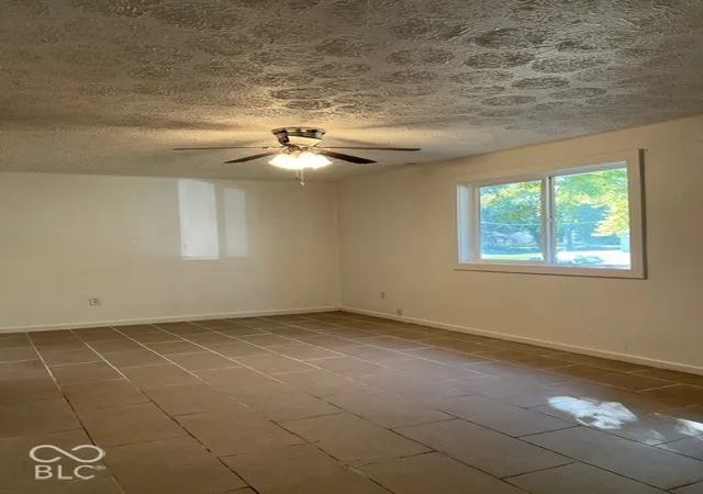 Photo 2 of Single family home for sale at 2413 N Kenyon St, Indianapolis, IN 46219 | MLS# 22133170 | Listing updated on 2026-10-27