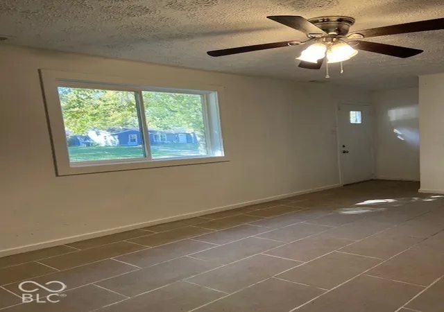Photo 3 of Single family home for sale at 2413 N Kenyon St, Indianapolis, IN 46219 | MLS# 22133170 | Listing updated on 2026-10-27