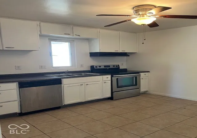 Photo 2 of Single family home for sale at 2407 N Kenyon St, Indianapolis, IN 46219 | MLS# 22133244 | Listing updated on 2026-10-24