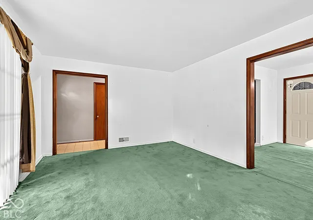 Photo 3 of Single family home for sale at 3609 N Lesley Ave, Indianapolis, IN 46218 | MLS# 22133368 | Listing updated on 2026-10-26