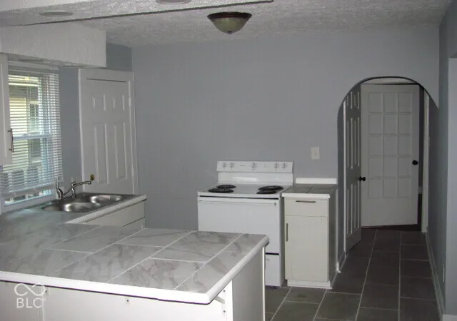 Photo 3 of Multi family home for sale at 3925/3927 Byram Ave, Indianapolis, IN 46208 | MLS# 22133521 | Listing updated on 2026-10-27