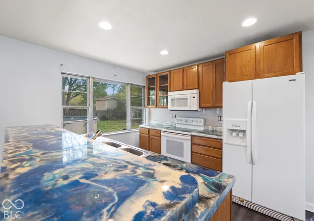 Photo 4 of Single family home for sale at 2715 S Kenmore Rd, Indianapolis, IN 46203 | MLS# 22133953 | Listing updated on 2026-10-29