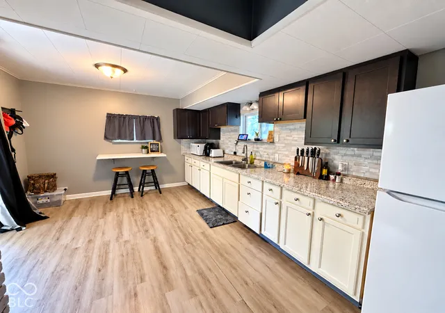 Photo 4 of Single family home for sale at 227 N Fenton Ave, Indianapolis, IN 46219 | MLS# 22134090 | Listing updated on 2026-10-30