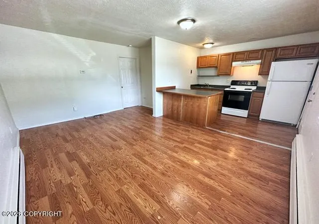 Photo 4 of Multi family home for sale at 1227 E 11th Avenue, Anchorage, AK 99501 | MLS# 26-6779 | Listing updated on 2026-09-04