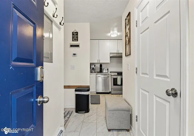 Photo 3 of Sale Pending at 10057 Thimble Berry Dr, Anchorage, AK 99515 | MLS# 26-10743 | Listing updated on 2026-09-16